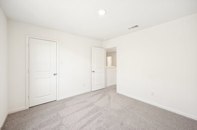 Unfurnished bedroom with carpet flooring and recessed lighting