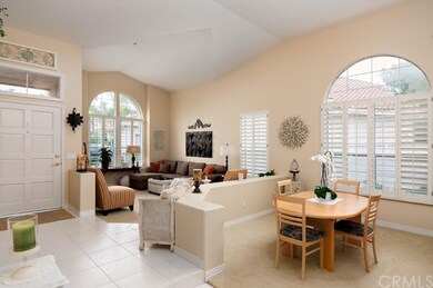 tile entry and wood shutters throughout the house