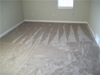 Master bedroom with new carpet & fresh paint.