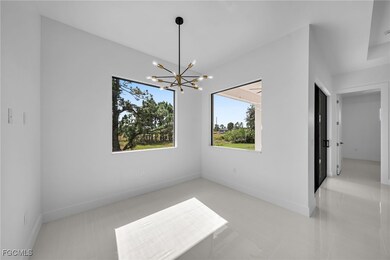 1150 Eclipse St E, Lehigh Acres, FL 33974 - photo 3