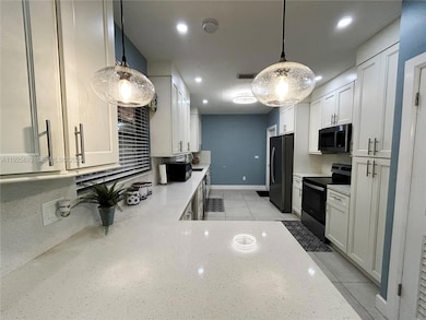 1140 NE 204th St, Miami, FL 33179 - photo 4