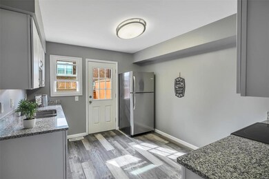 Kitchen with door that exits to your private deck