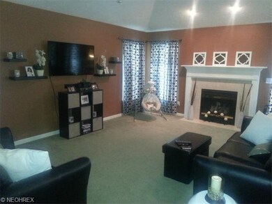 Spacious Great room offers wall to wall carpet, ca