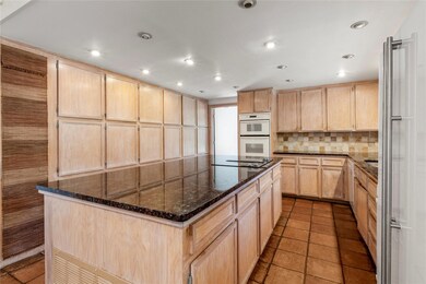 Kitchen featuring tile patterned flooring, tastefu