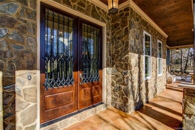 Front Door with custom iron grill work