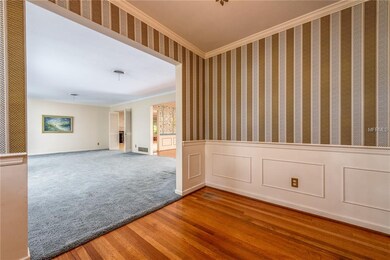 View from front door with spacious foyer and wood 