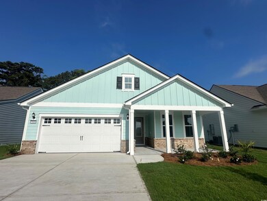 Craftsman house featuring a front yard, a porch, a