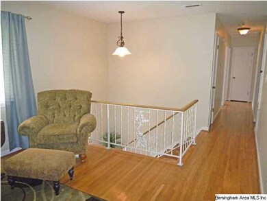VIEW FROM LIVING ROOM DOWN THE HALLWAY.