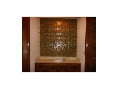 Fun glass shelving to hold your wine glasses or di