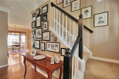 Foyer flows into kitchen or upstairs.