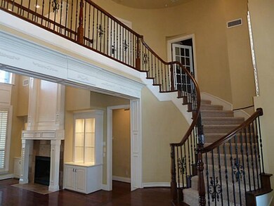 Entry Curved staircase.