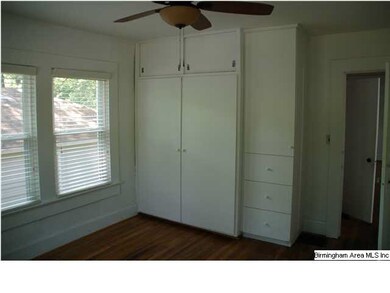 The guest bedroom has plenty of windows for natura