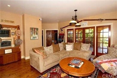 Entry level has bar, secondary bedrooms, full bath