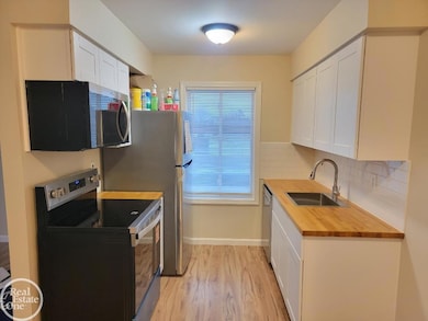 17118 Kingsbrooke Dr unit 77, Clinton Township, MI 48038 - photo 7