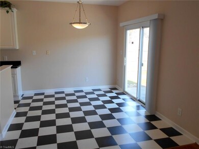 Breakfast area leads to back patio