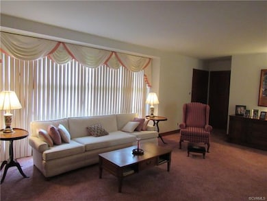 Huge living room with picture window.