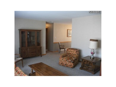 VIEW FROM THE LIVING ROOM FACING THE DINING AREA AND HALLWAY