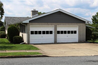 Parking outside the 2-Car Garage for additional ve