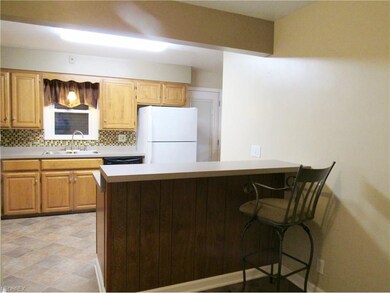 Bar stool area in the kitchen in addition to eatin