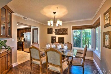 Formal Dining with Wood Floors, Crown Molding and 