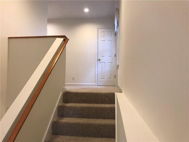 The upstairs entryway is large enough for a large