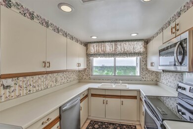 The kitchen boasts original charm, while featuring