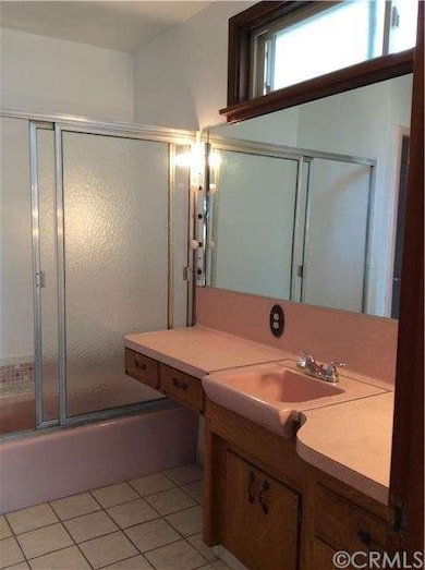 Main bath with a separate  tiled shower stall,tub,