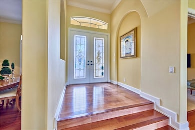 Double Door Entry with Transom window above, crown