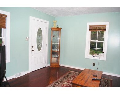 Living Room. Laminate hardwood floors, steel door 