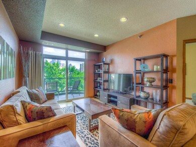 Lovely living room with patio door to your balcony