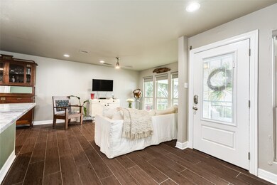 This view of the entry looks into the living area.
