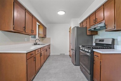 The galley kitchen offers plenty of cabinet space.