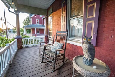 The wrap around front porch was recently renovated with Trex Composite Maintenance-Free Wood.