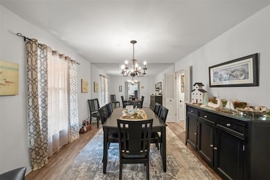 Formal dining room can easily hold a table that seats 8