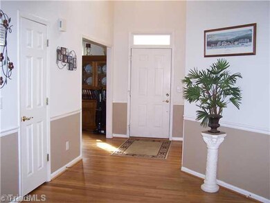 Entry. The large 2 story foyer is open to the 2nd floor and flanked by the dining room and living room on either side of the front door.