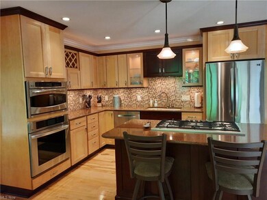 Island cooktop and double wall ovens