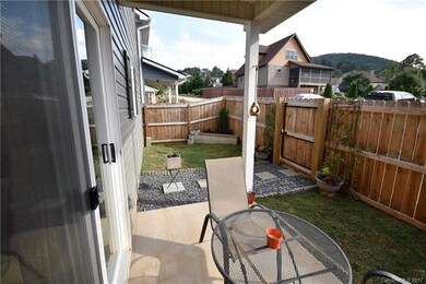 Another Shot of the Back Porch and Fenced Backyard