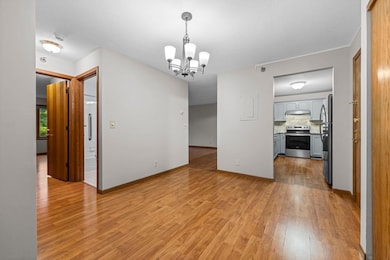 Defined yet open, the formal dining area offers a welcoming space for entertaining or everyday dining. Its generous proportions easily accommodate larger tables and buffet pieces.