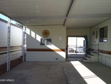 SHED IN CARPORT