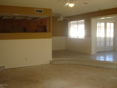 View Kitchen & french doors to patio