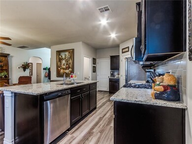 Kitchen:  Note the 3-cm granite, stainless applian