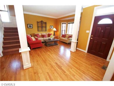 Foyer - Sunny open foyer and living room.