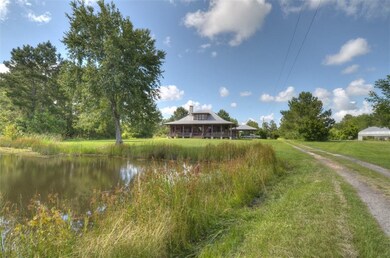 Home overlooks fish pond.