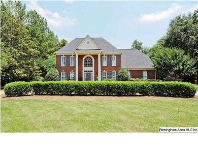Stately home on Baneberry Lake in Riverchase.