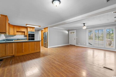 Kitchen featuring stainless steel refrigerator wit