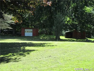 Backyard. Two additional outbuildings...Great for 