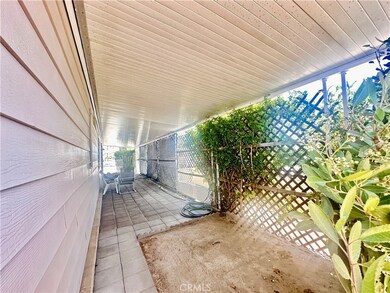 Covered side patio is a blank slate
