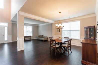 Pretty Two Story Entry with Side and Transom Windo