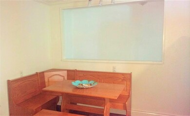 The other side of the spacious freshly painted eat