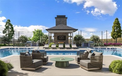 View of pool with an outdoor living space with a f